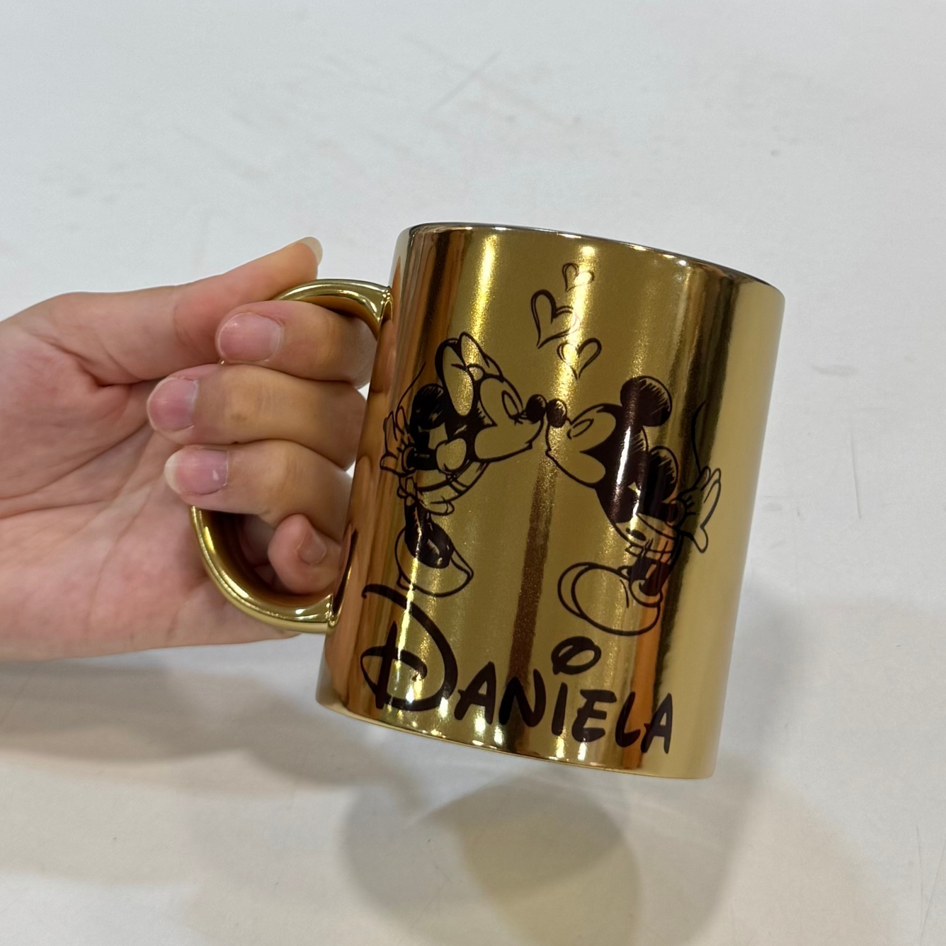 Taza dorada Disney